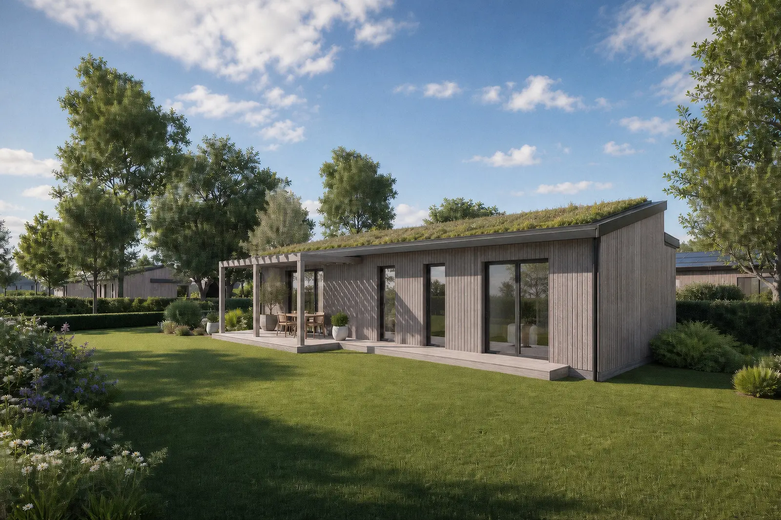 Toiture végétalisée d'une maison passive de l'éco-quartier, pergola et jardin fleuri