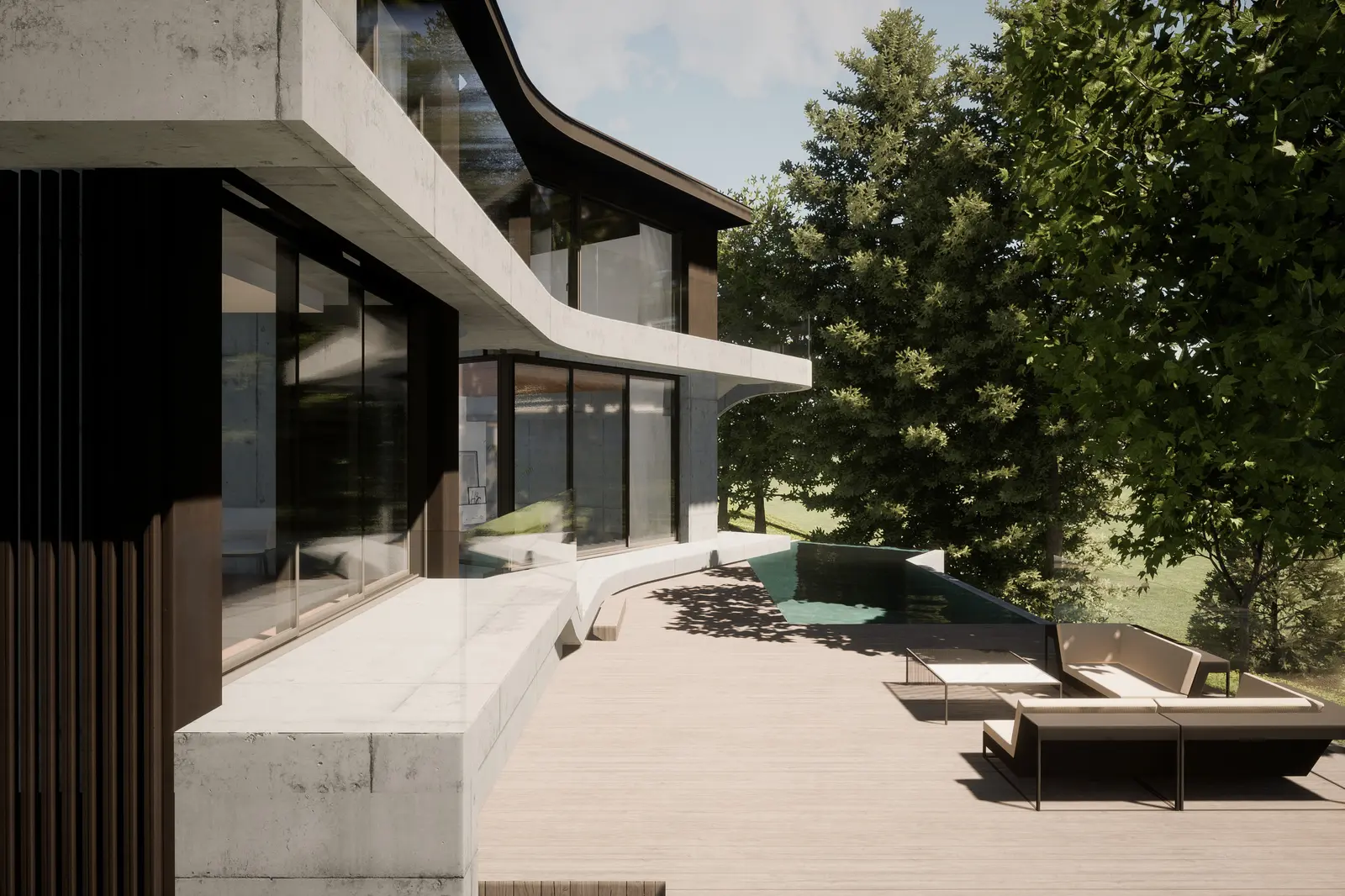 Vue de la villa béton et bois dans les arbres conservés du site de Saint-Cyr