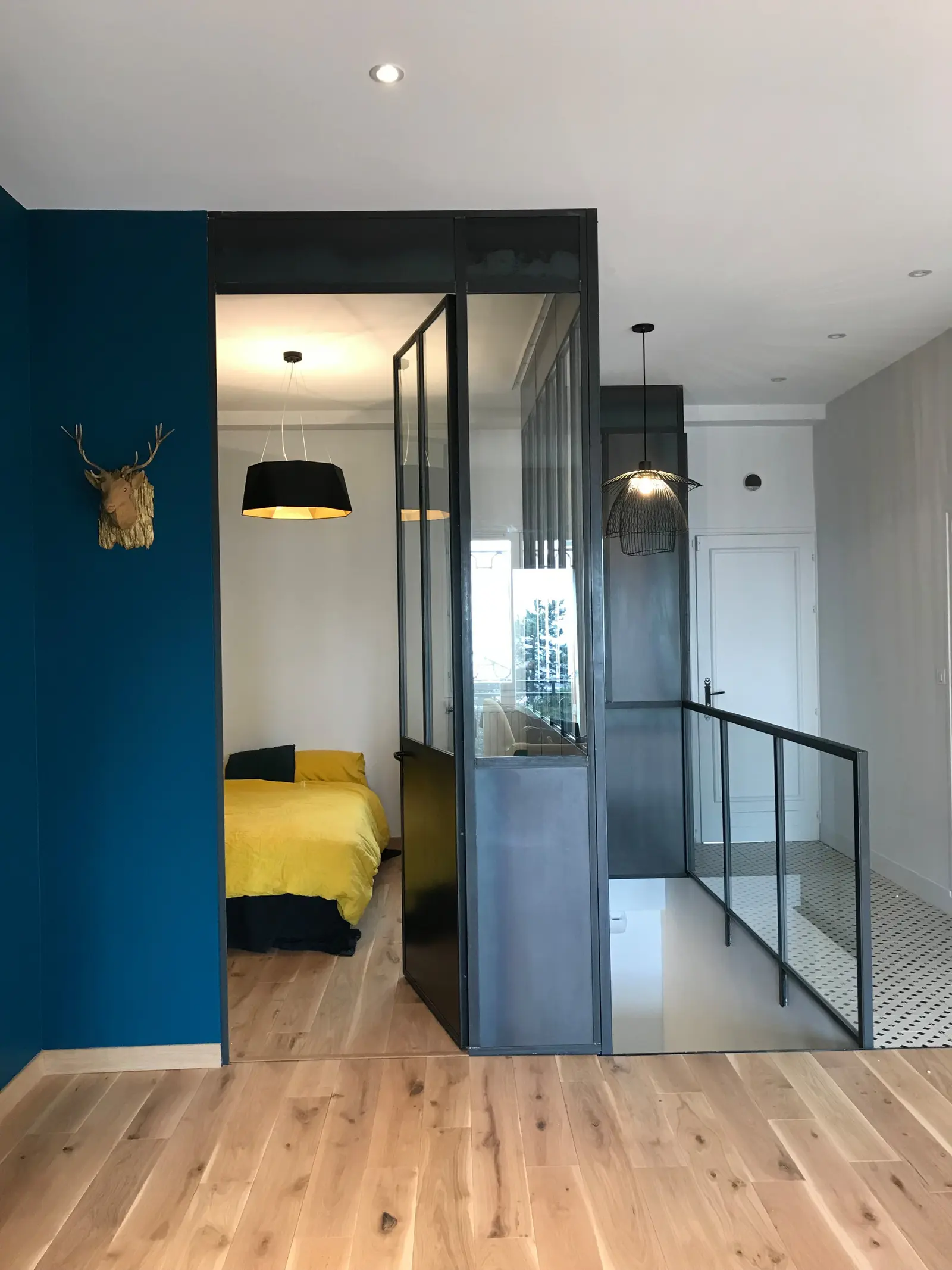 Espace de vie du triplex après la rénovation en deux temps